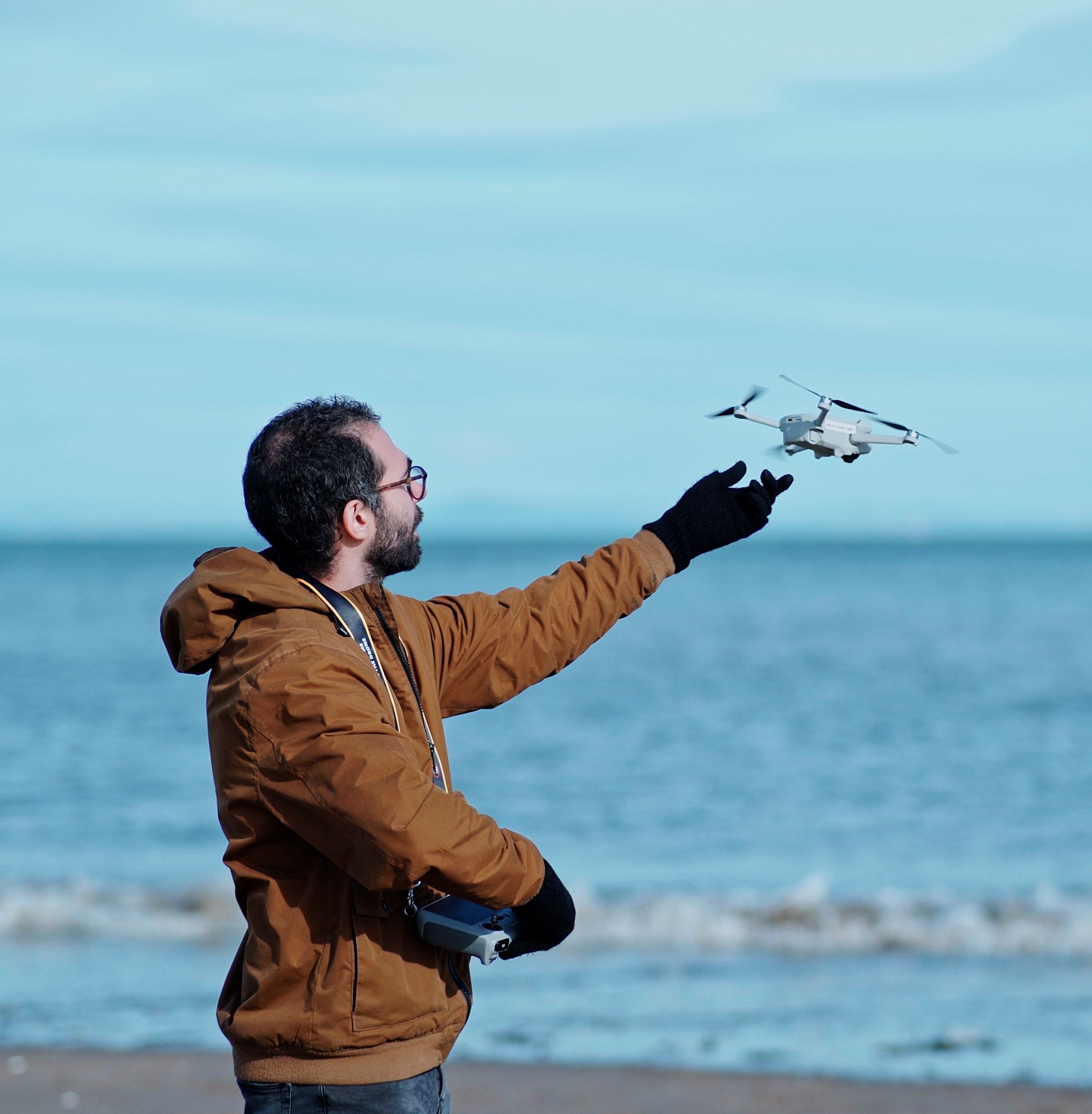 cinematographer manuel pennuto flying drone DJI mini 4 pro in portobello beach, edinburgh
