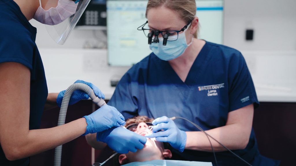 Dental procedure on a young man at Truss dental video production for Scotland Dentist